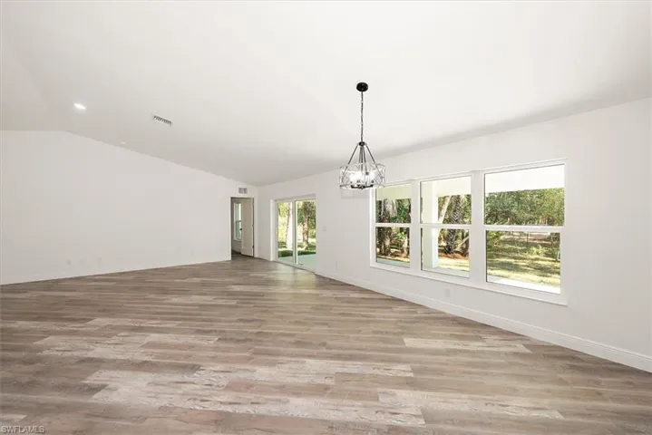 Dining area just off the kitchen with a great view of the backyard.