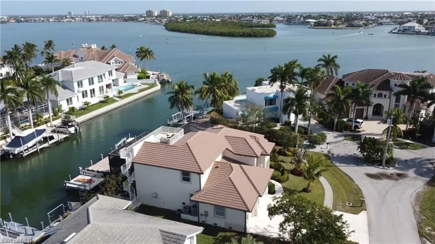 Bird's eye view featuring a water view and a residential view