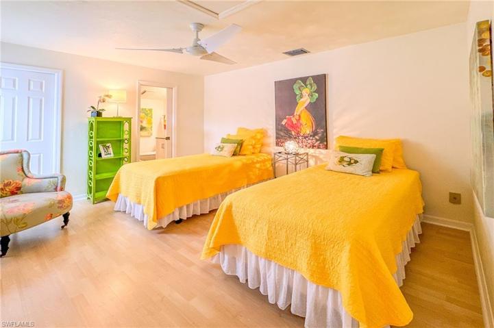 Bedroom #2 upstairs basks in sunlight from all directions