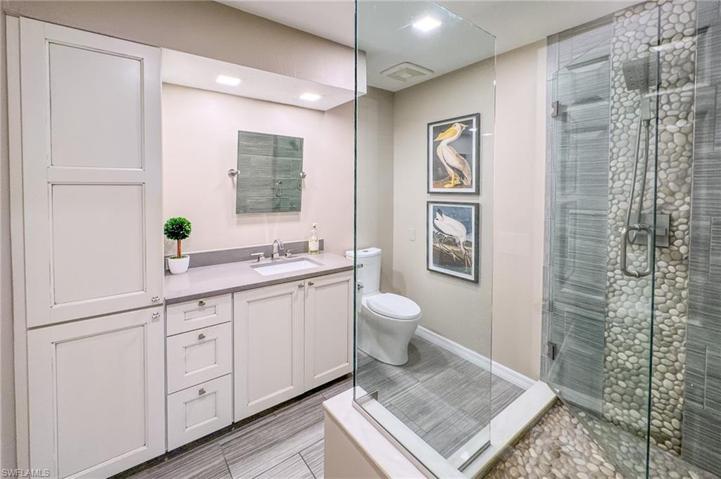 The Master bath is so elegant with the stone and tile finishings