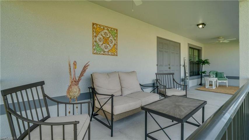 Large front porch provides an exterior living room!