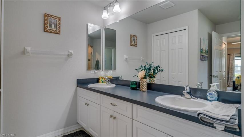 Dual sinks and large linen closet!