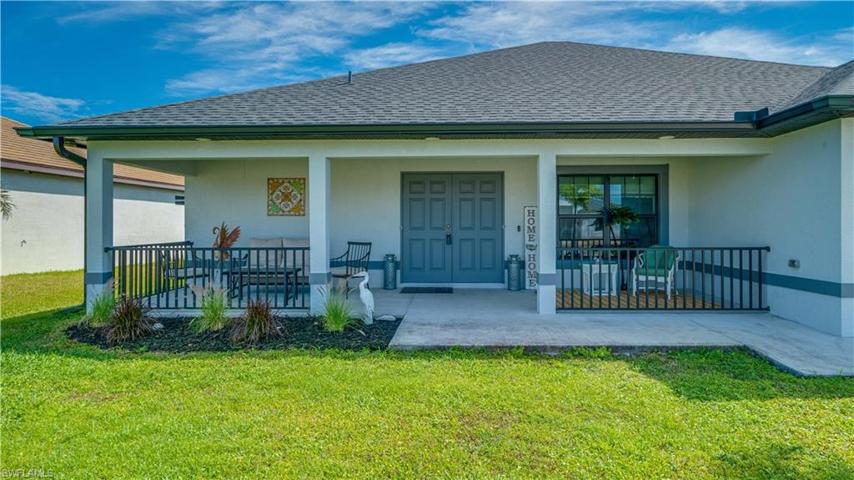 Look at this fabulous front porch! Perfect for morning coffee, reading, or entertaining! Double door entry!