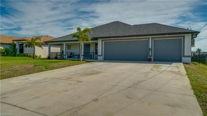 Large 3 car garage with an enormous driveway! So much parking! Garage has a mini-split AC system.