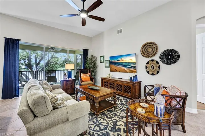 Tiled living room with ceiling fan
