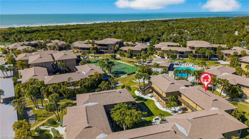 Aerial view of residential area with a nearby body of water