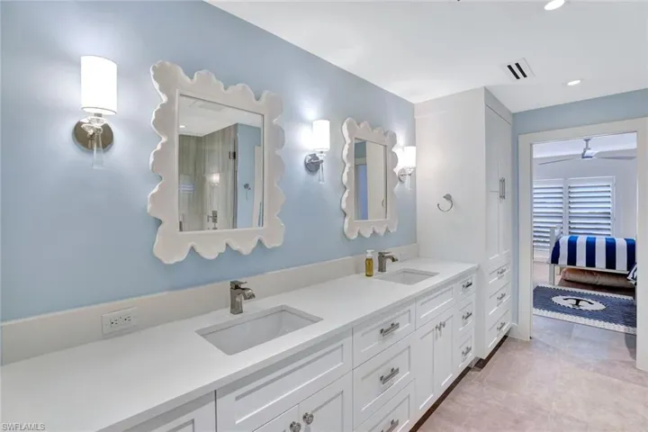 Bathroom with vanity and tile patterned floors