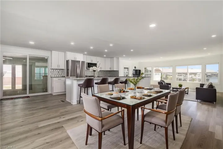 Virtually Staged Living, kitchen and dining areas