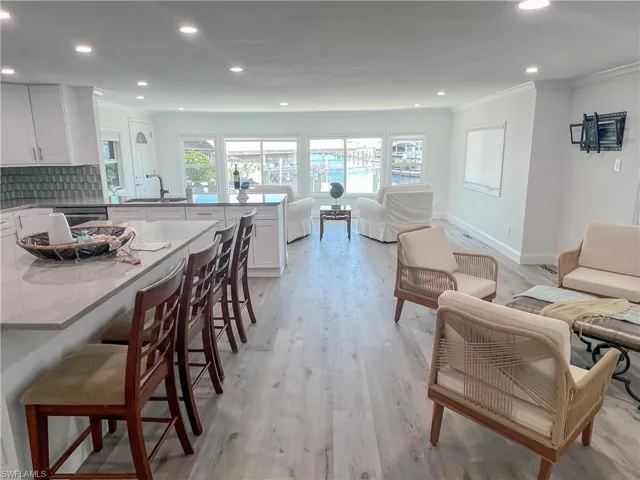 kitchen dining and living area with beautiful water views