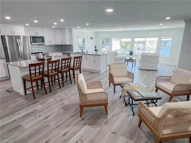 kitchen dining and living area with beautiful water views