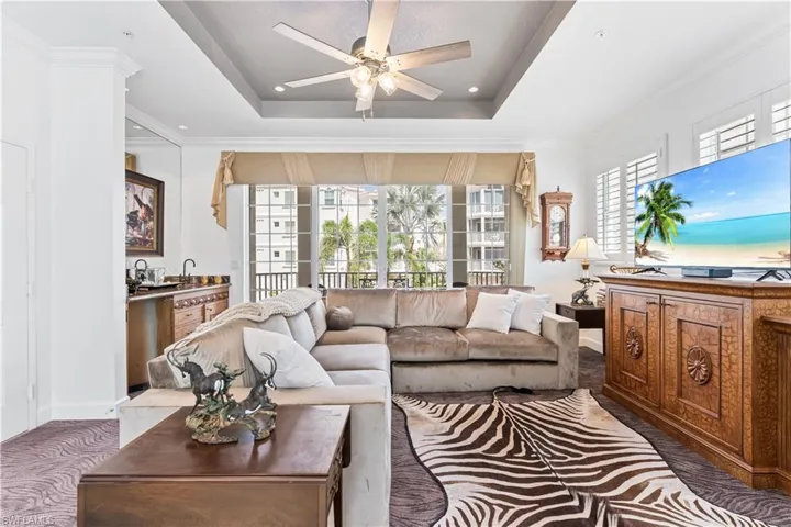 This is your second living space. Great lanai and a wet bar. Tray ceiling. Plantation shutters.