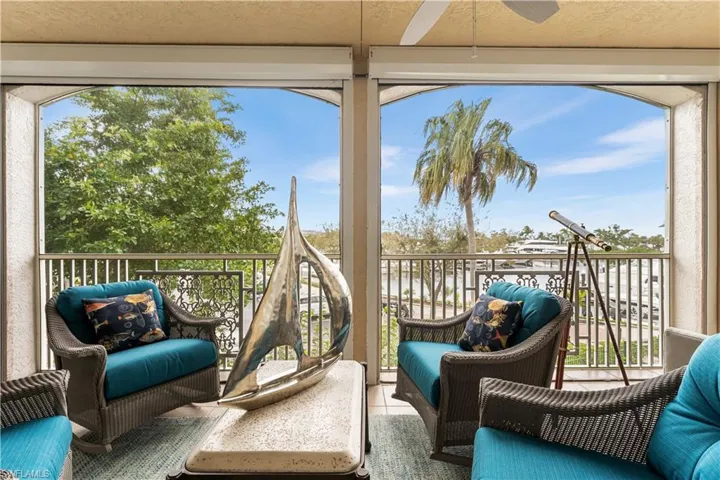 Relax on your front lanai sipping your favorite beverage and watch the boats come in and out of the marina! Hurricane protection! New roll down shutters on the front lanai.