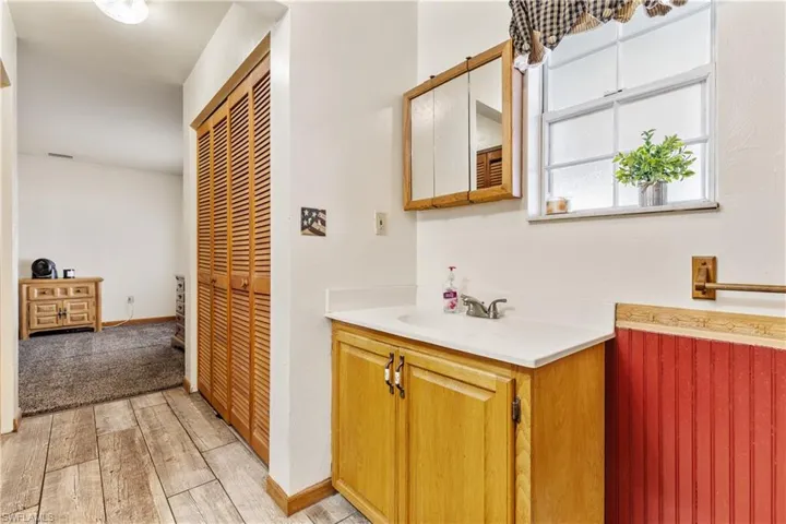 His & her sinks, linen closet