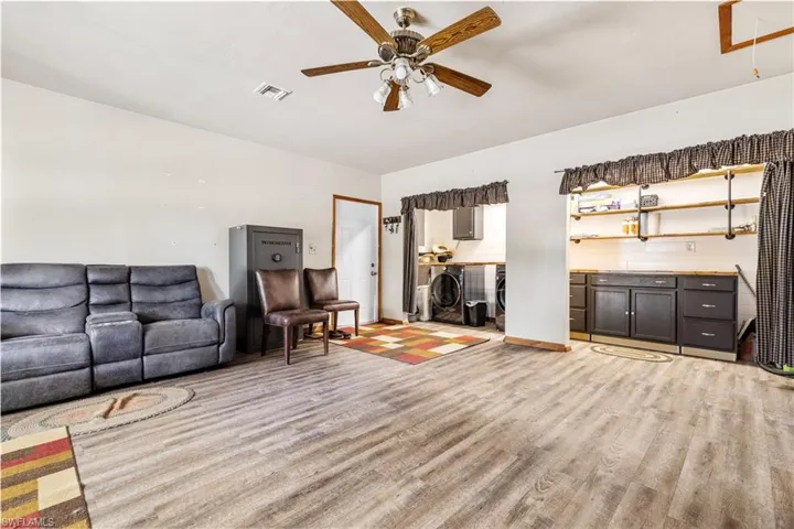 857 sqft bonus room with laundry/storage space
