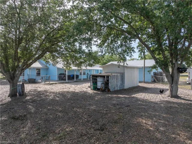 Two storage sheds in backyard, NEW water softener system