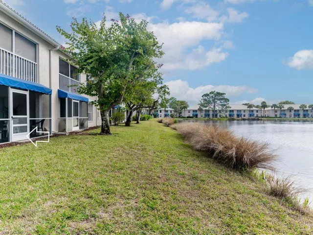 View of yard with a water view