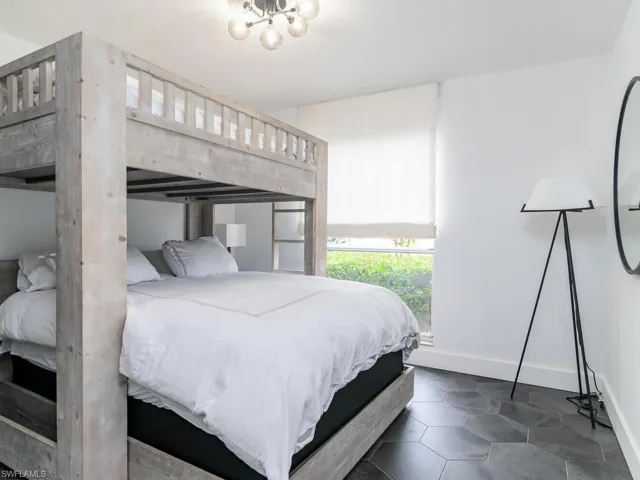 Bedroom featuring baseboards