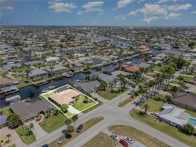 Drone / aerial view featuring a water view and a residential view