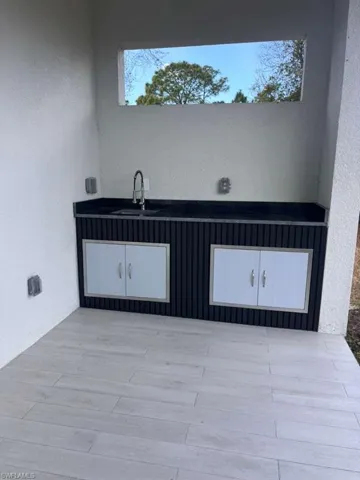 View of patio / terrace with a sink