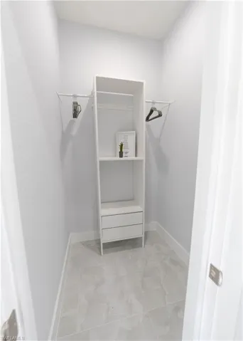 View of spacious walk-in closet