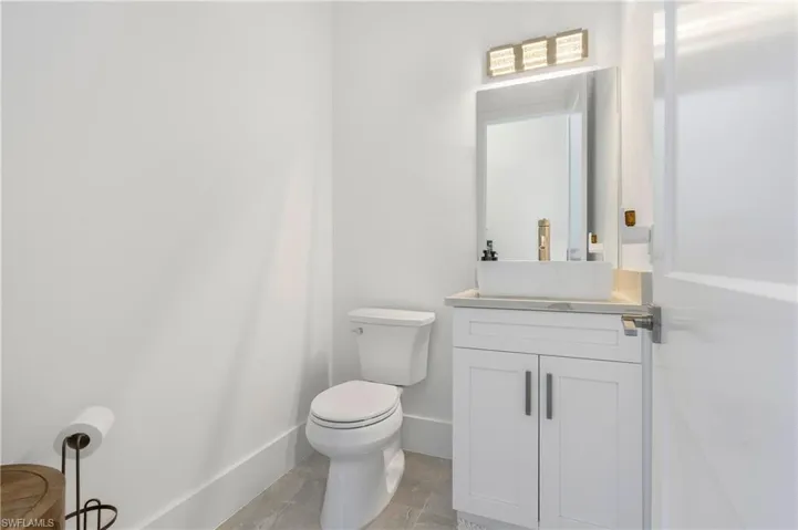 Bathroom with vanity and toilet