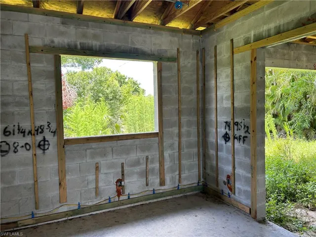 Dining Room with oversized window and access to lanai