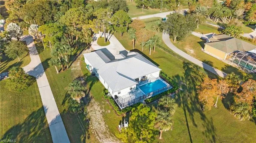 View from above of property featuring a pool area