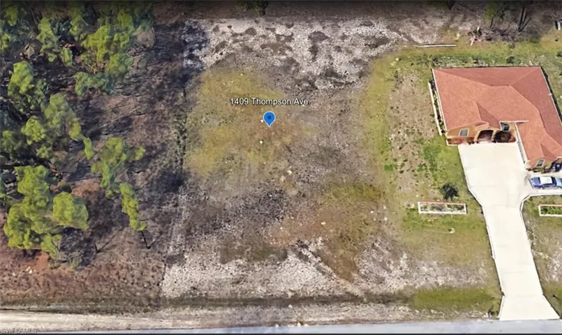 1409 Thompson Ave, Lehigh Acres Fl 33972