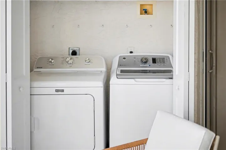 Laundry area featuring washing machine and dryer