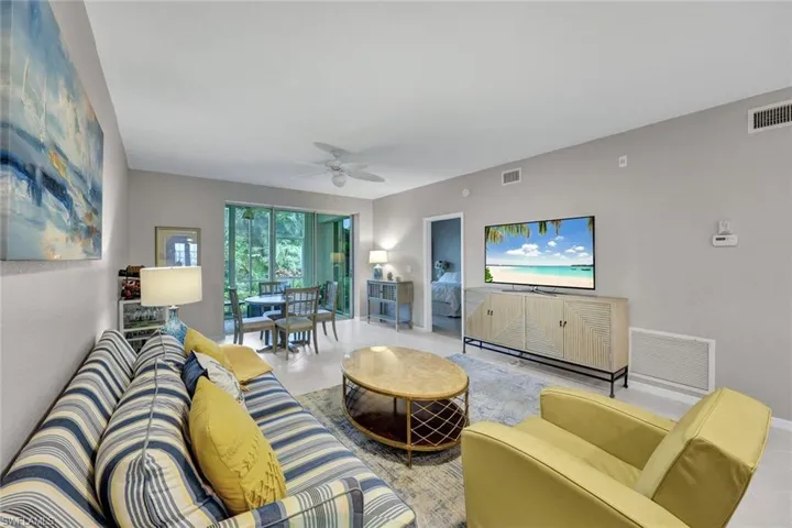 Living room featuring ceiling fan