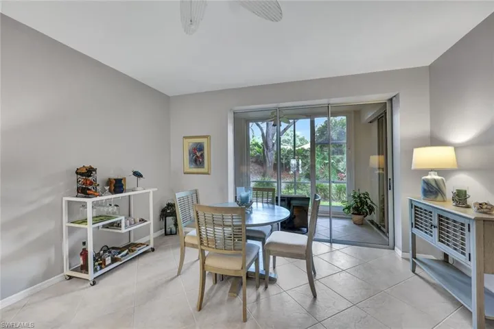 Tiled dining area with ceiling fan