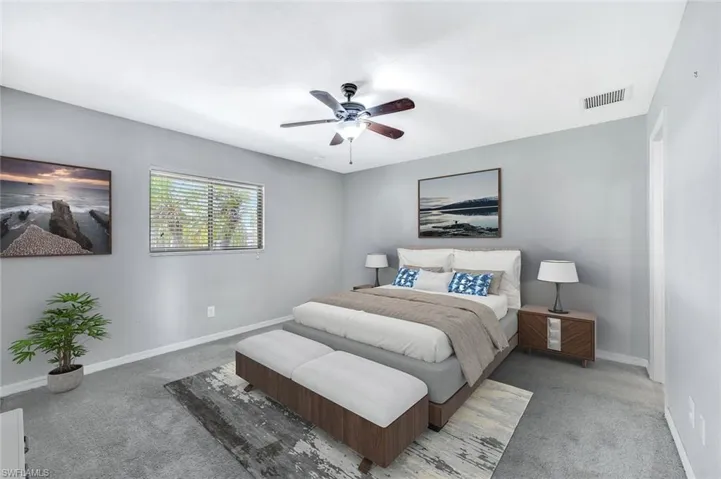Virtual staging, Bedroom featuring light carpet, baseboards, and ceiling fan