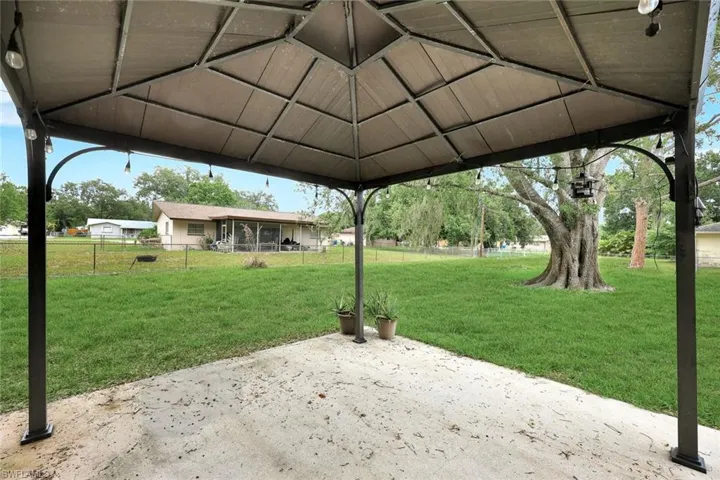 View of yard with a patio area