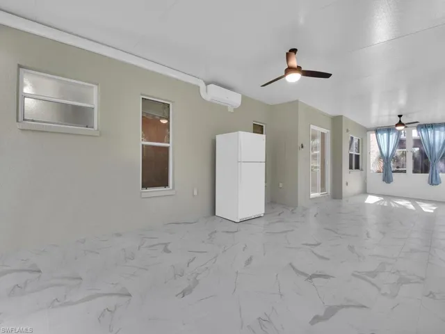 New Florida Room added in 2022 that's 570 sq ft under air w/ Fridge & Mini-Split