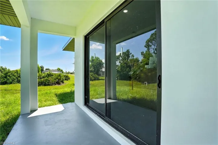 Doorway to outside with concrete floors