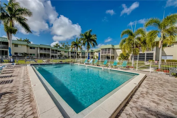 Community pool featuring a patio area