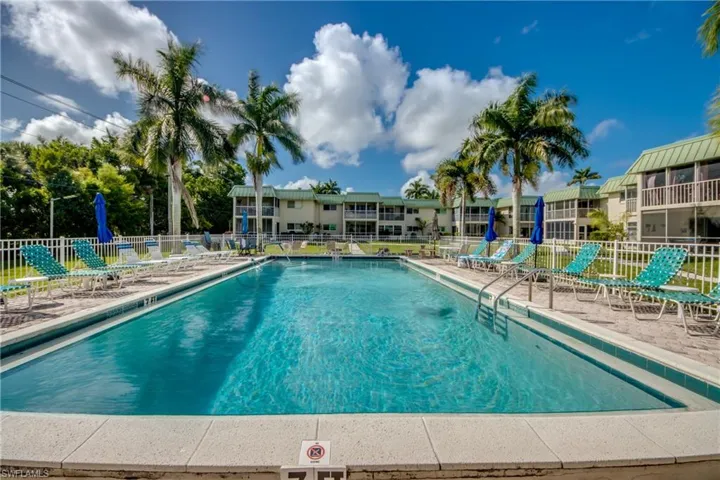 Community pool featuring a patio area