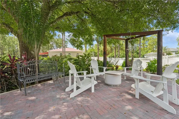 Fire pit patio with swing