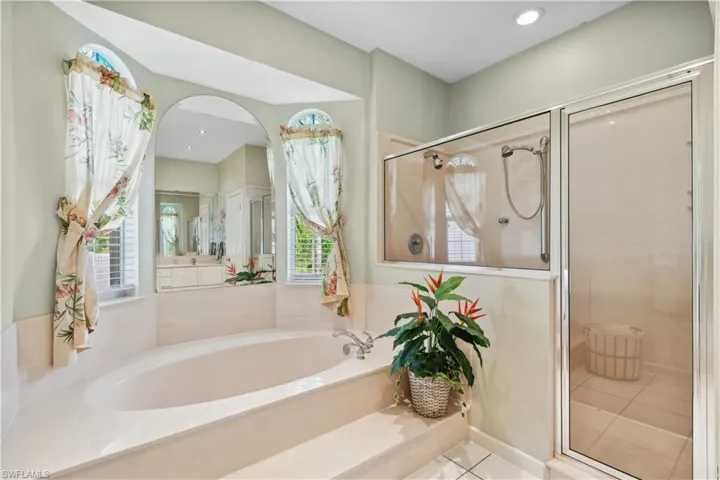 Guest suite bath with soaker tub and shower