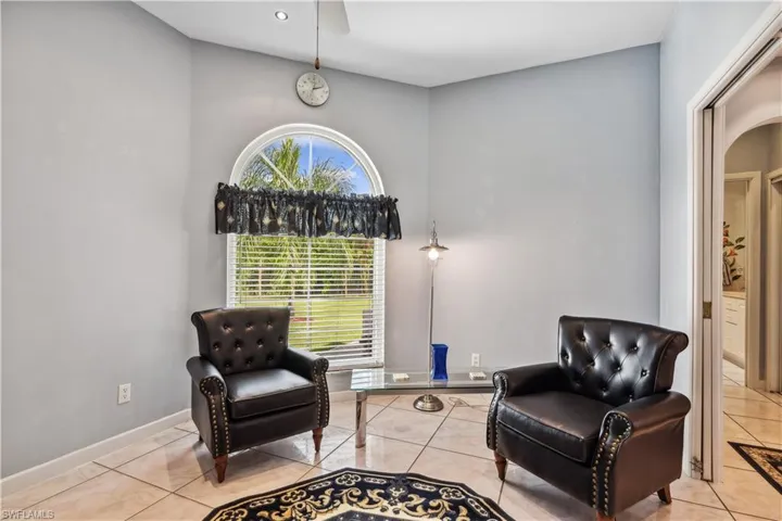 Guest suite with sitting area and pocket sliders