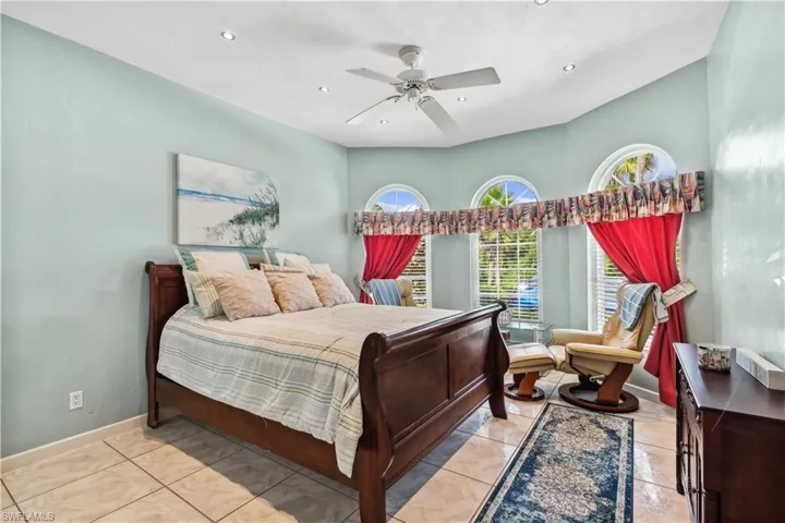 Guest bedroom with tile floors