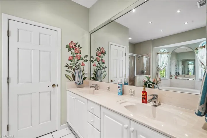 Guest suite bathroom with double vanities