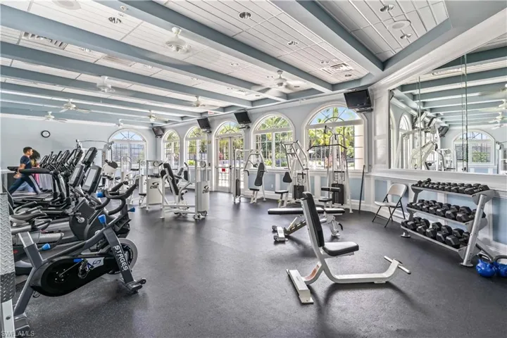 Workout area featuring ceiling fan