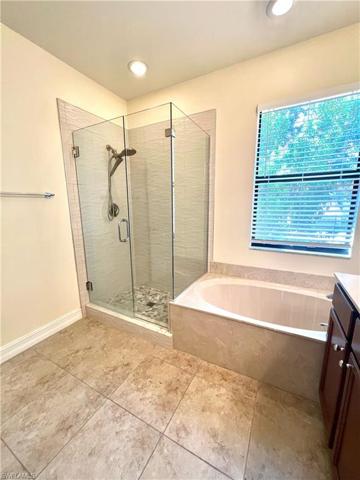 Newly updated Shower-new tile throughout and glass door