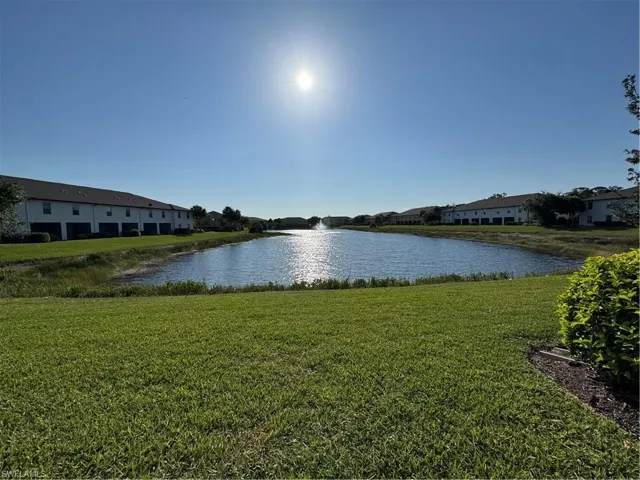 Water view featuring nearby suburban area