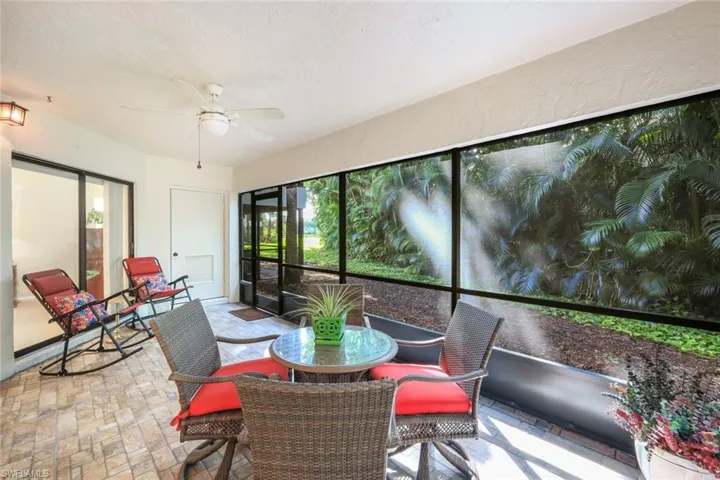 Back lanai with ceiling fan and storage unit