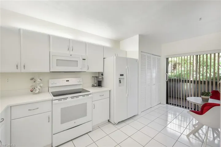 Kitchen with entrance to front lanai