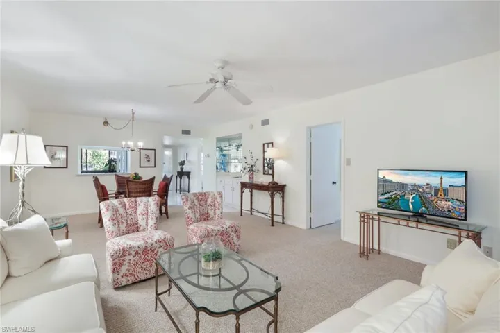 Living-room with view of dining-room and wet bar