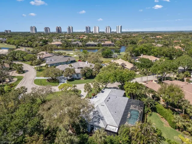Drone / aerial view with a view of city and a water view