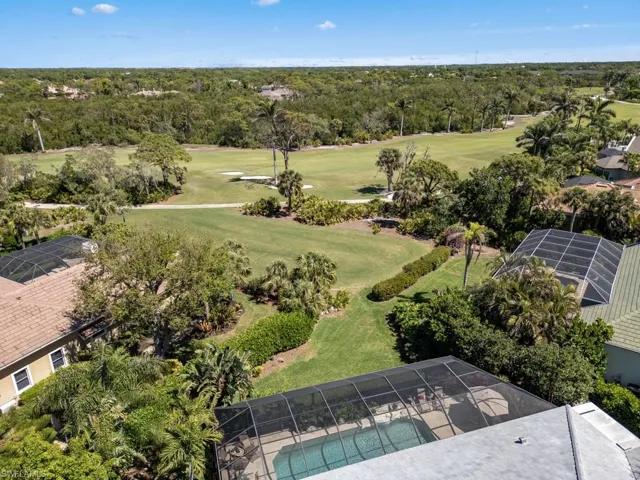 Birds eye view of property featuring view of golf course